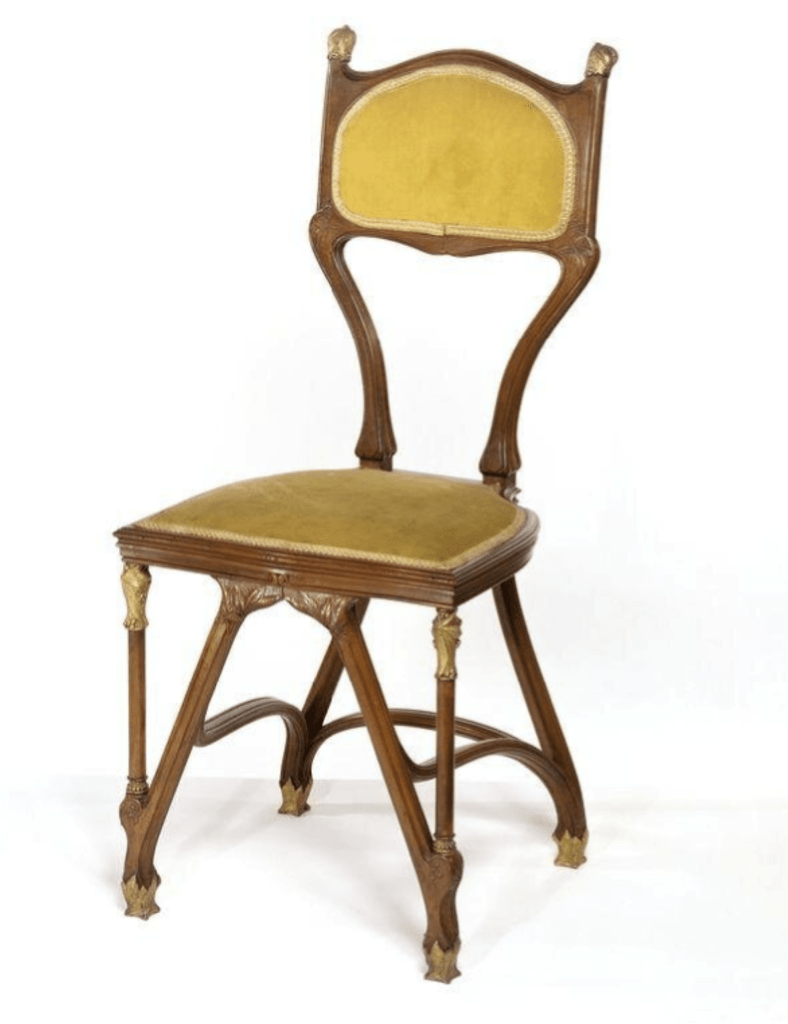 Chair with Carved and turned pearwood; mounts of gilt brass, velvet upholstery.  Designed by Louis Bigaux V&A